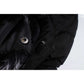 Mid-length women's winter coat with fleece lining and detachable hood close-up.