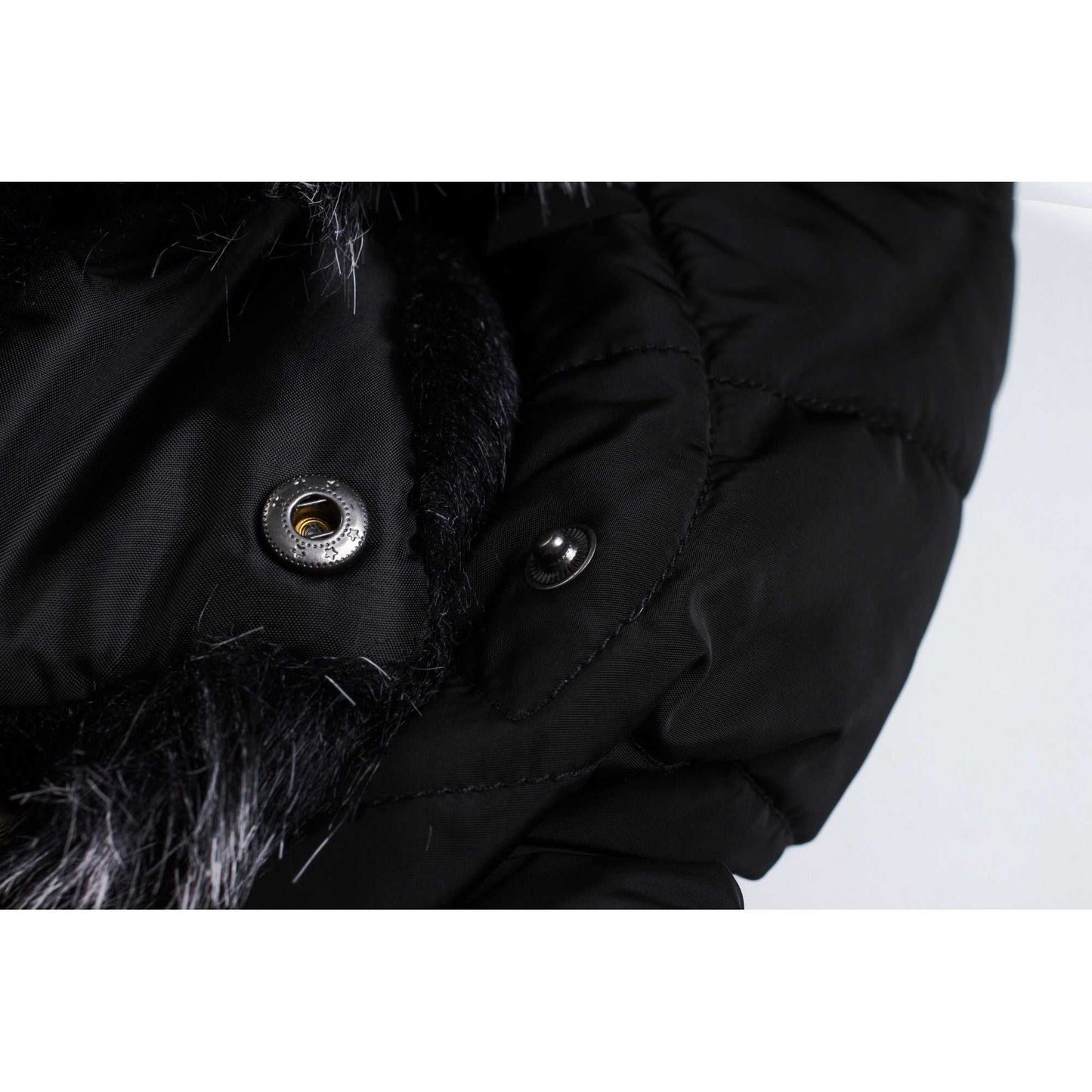 Mid-length women's winter coat with fleece lining and detachable hood close-up.