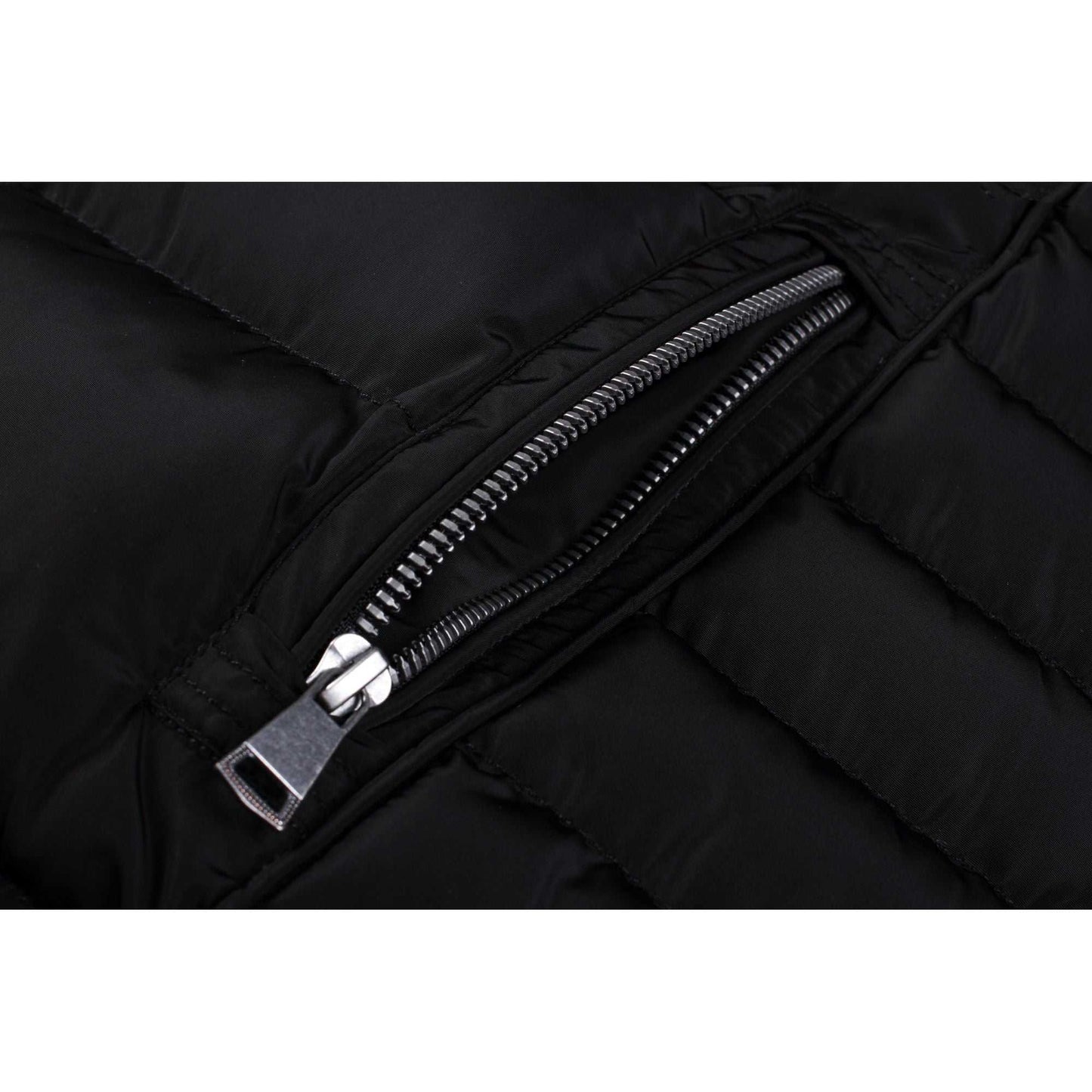 Mid length women's winter coat with fleece lining and side zip pocket.