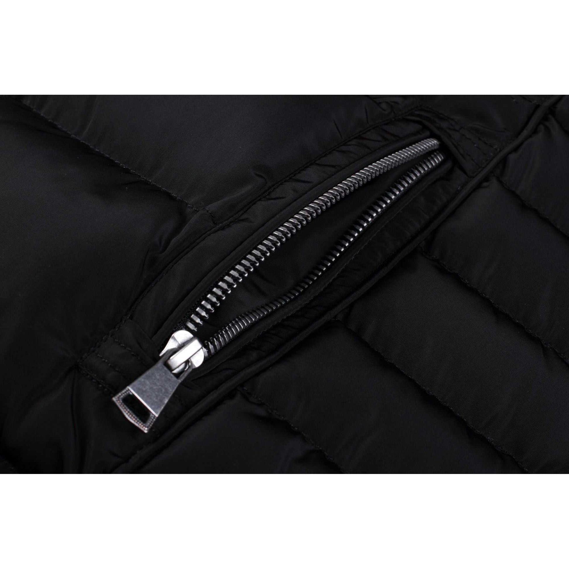 Mid length women's winter coat with fleece lining and side zip pocket.