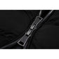 Close-up of zipper on black mid-length women's winter coat with fleece lining.