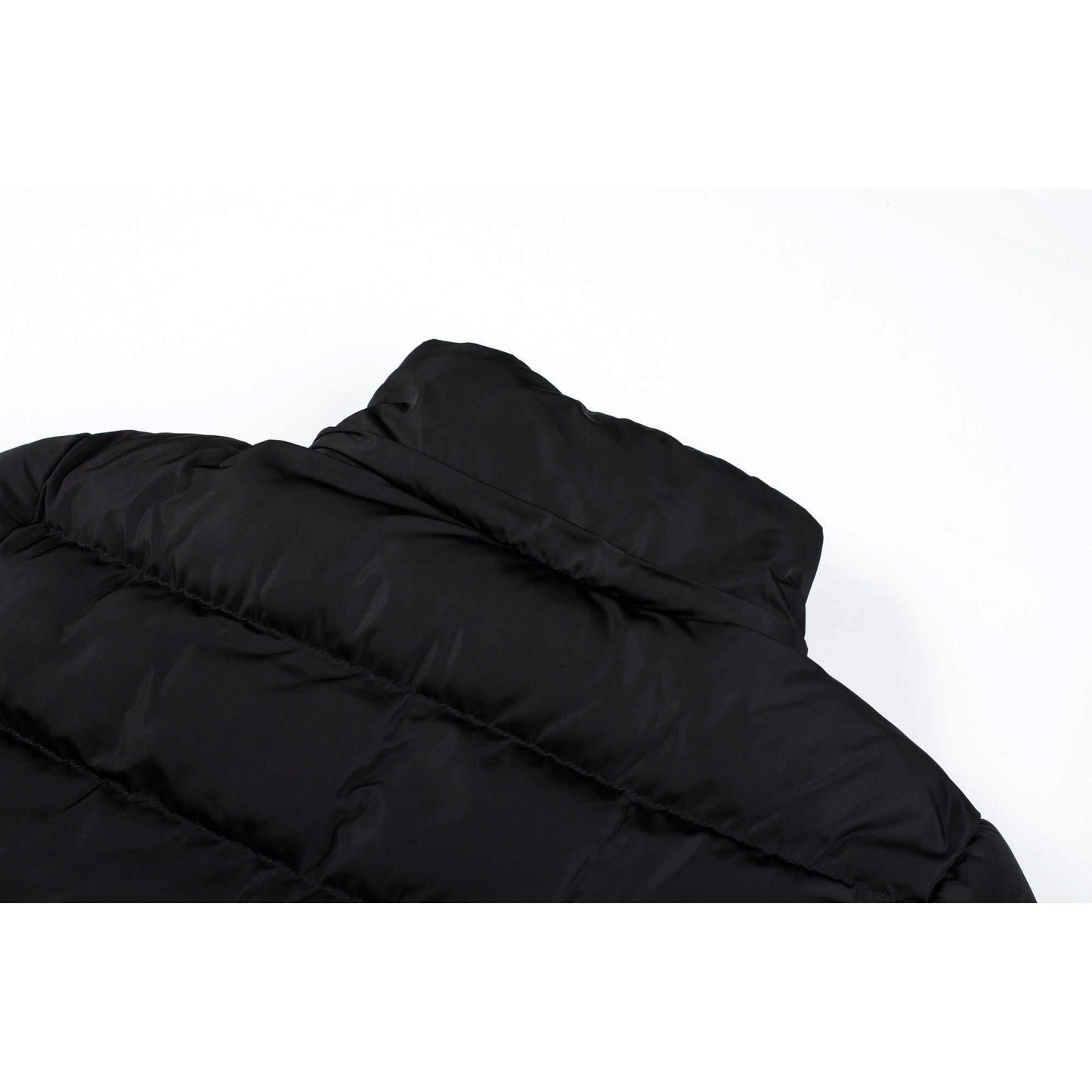 Mid length women's winter coat with fleece lining and detachable hood.