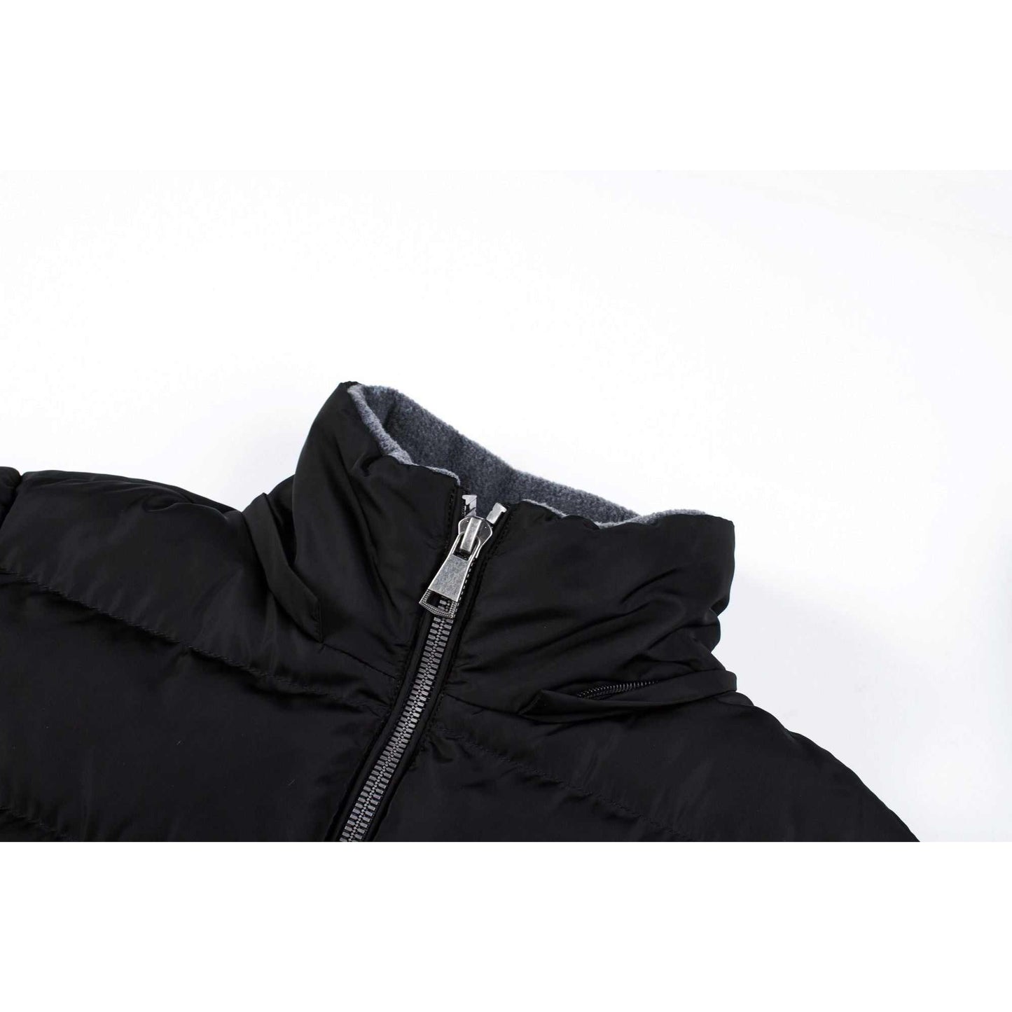 Mid-length women's winter coat with polar fleece lining, zip closure, and detachable hood.