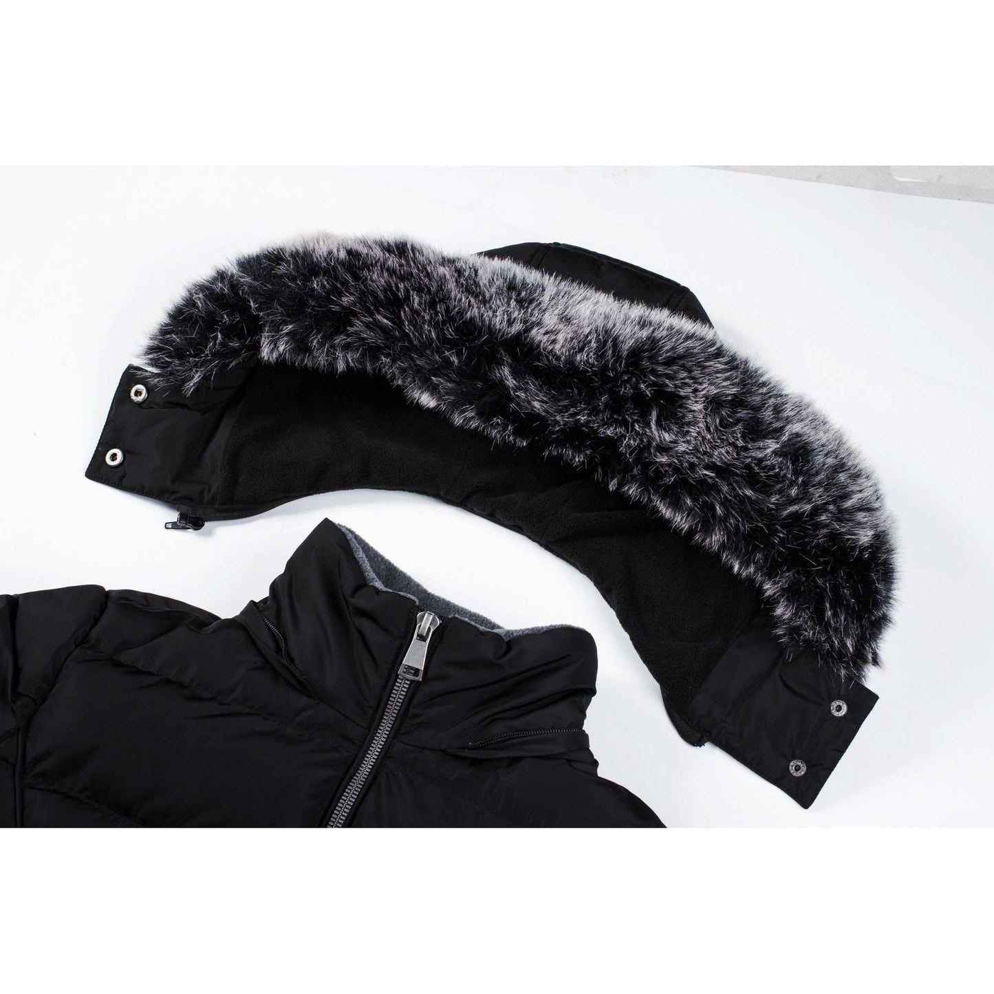 Mid-length women's winter coat with fleece lining and detachable hood.